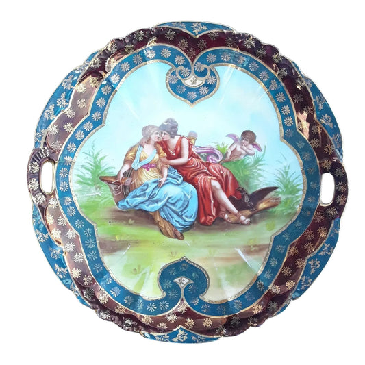 Close-up of central hand-painted romantic scene on Vienna porcelain plate