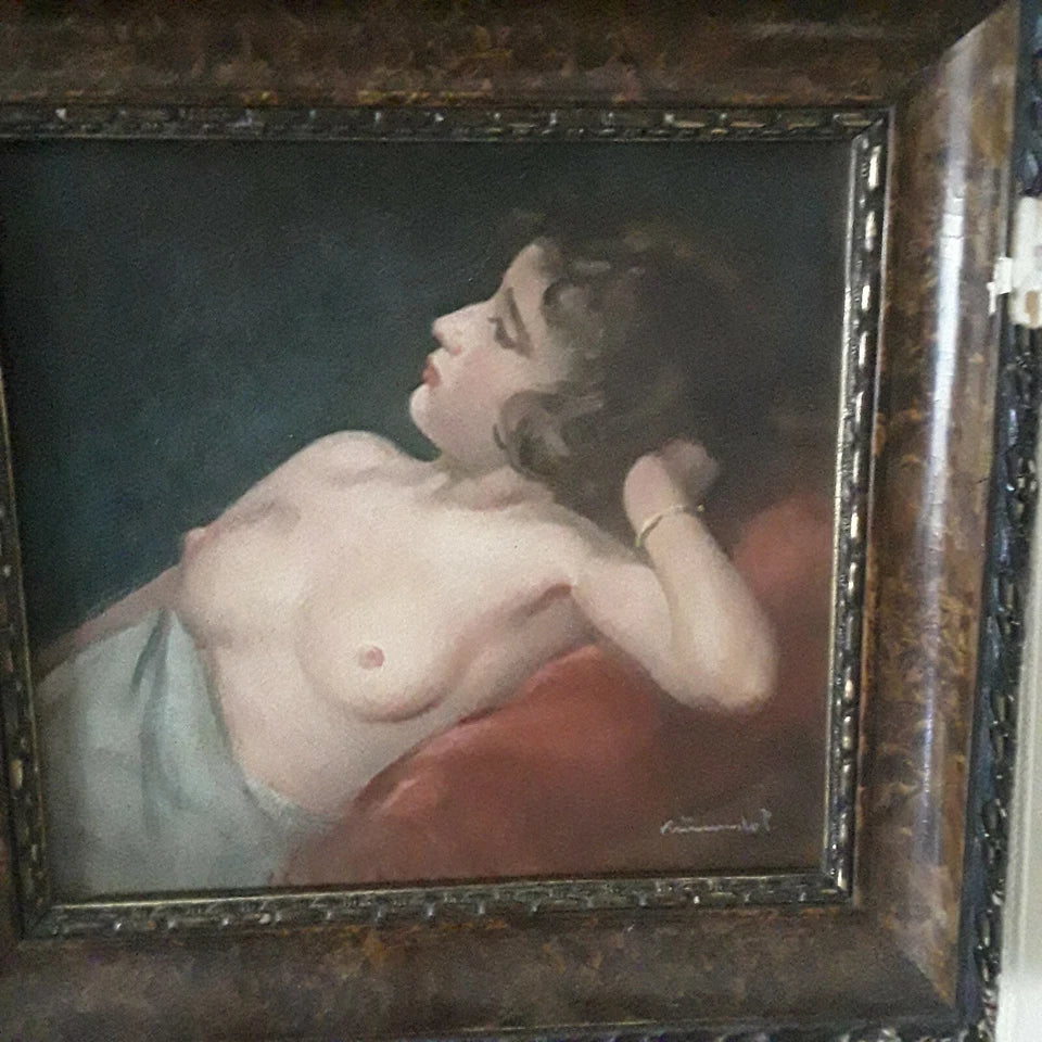 Vintage painting of a nude figure in a decorative frame