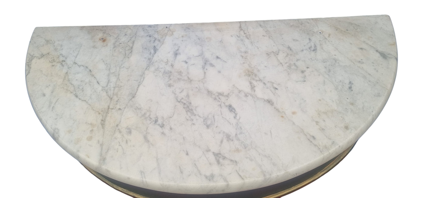 Close-up of white and grey veined marble top on Victorian demi-lune console table