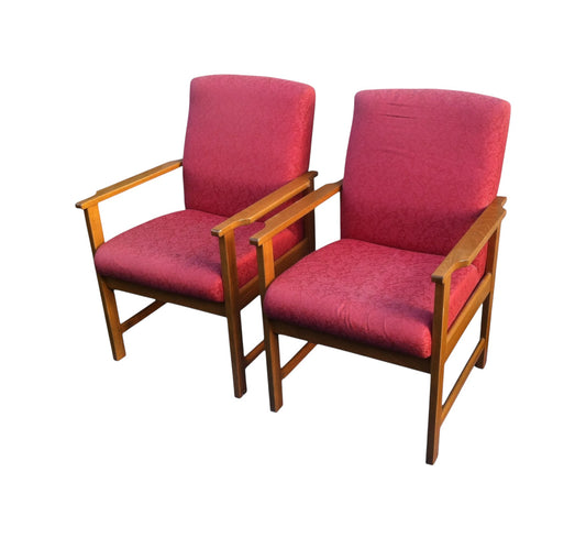 Pair of vintage Mid-Century Danish style lounge armchairs with beech wood frames and red retro fabric upholstery, circa 1960s–70s.