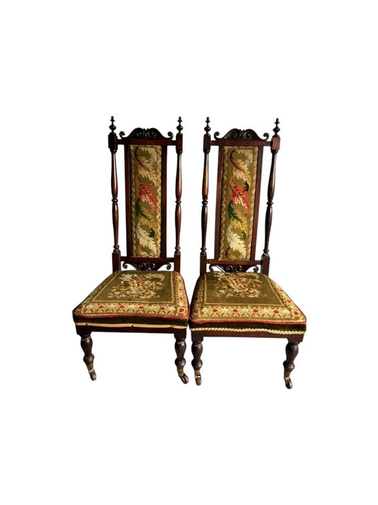 Pair of Victorian oak prayer chairs with tapestry upholstery, 19th century.