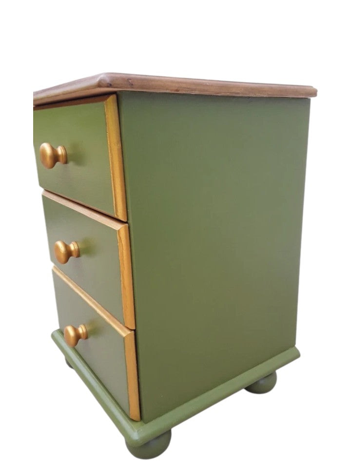 Pair of restored Victorian-style pine bedside chests with waxed antique tops, green painted bases, and three drawers, circa late 19th century style.