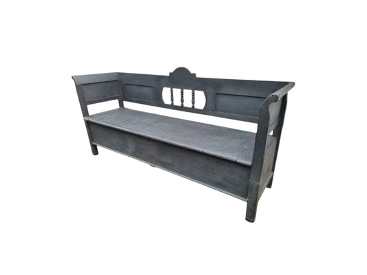 Wooden bench with decorative backrest on a white background